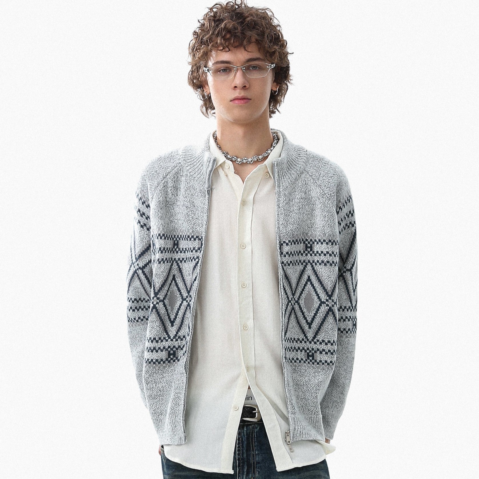 Maglione patchwork con nappe e texture