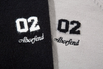 Étoile brillante | Pull moderne avec accents métalliques