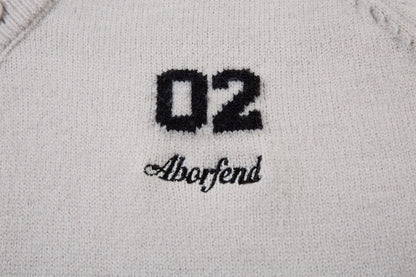 Varsity Button | Mock Neck Knit Sweater