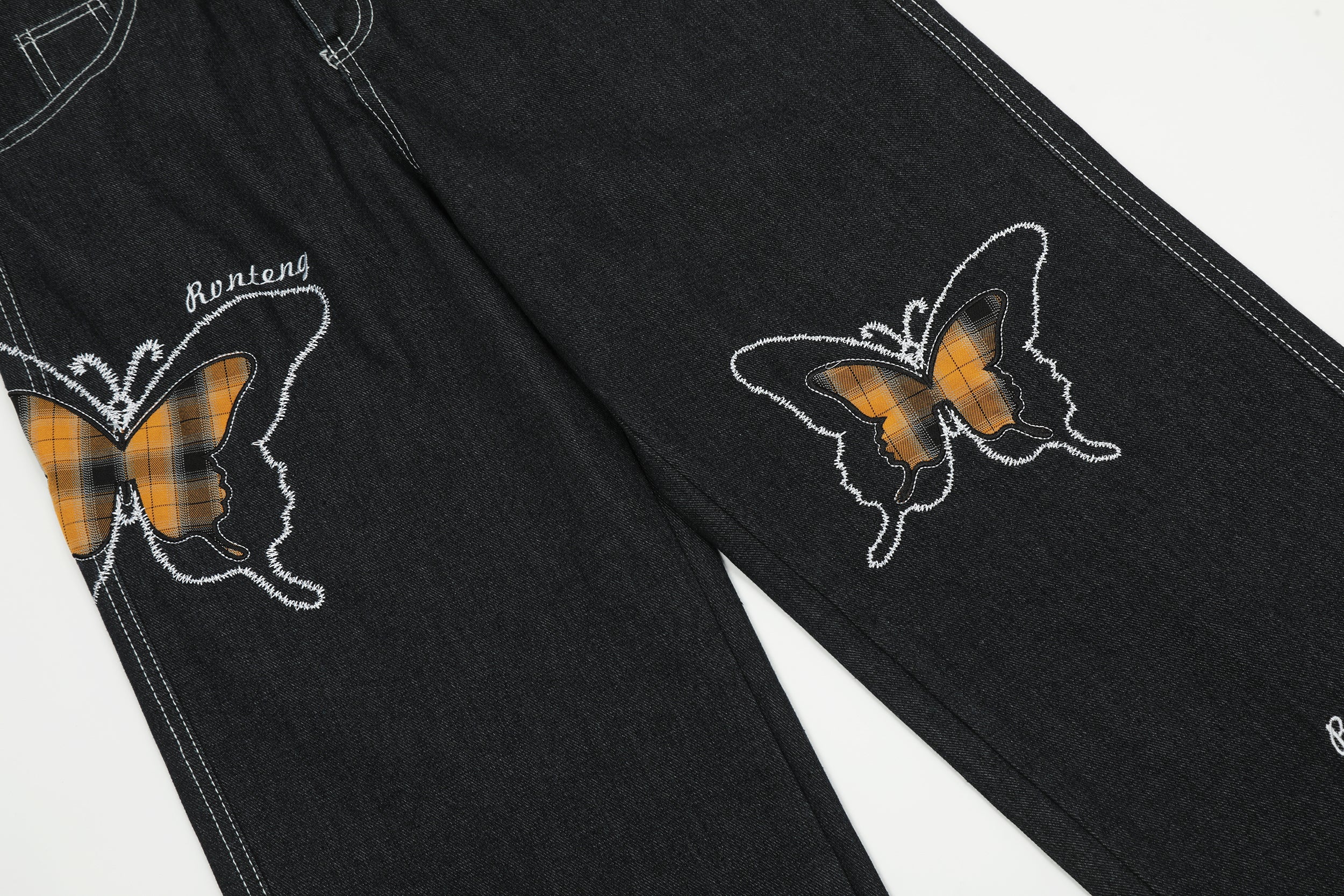 Broderie papillon | Jean en denim foncé