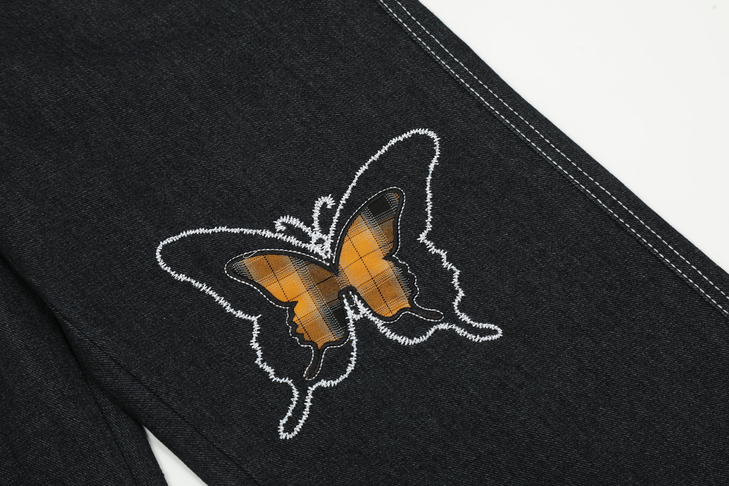 Broderie papillon | Jean en denim foncé