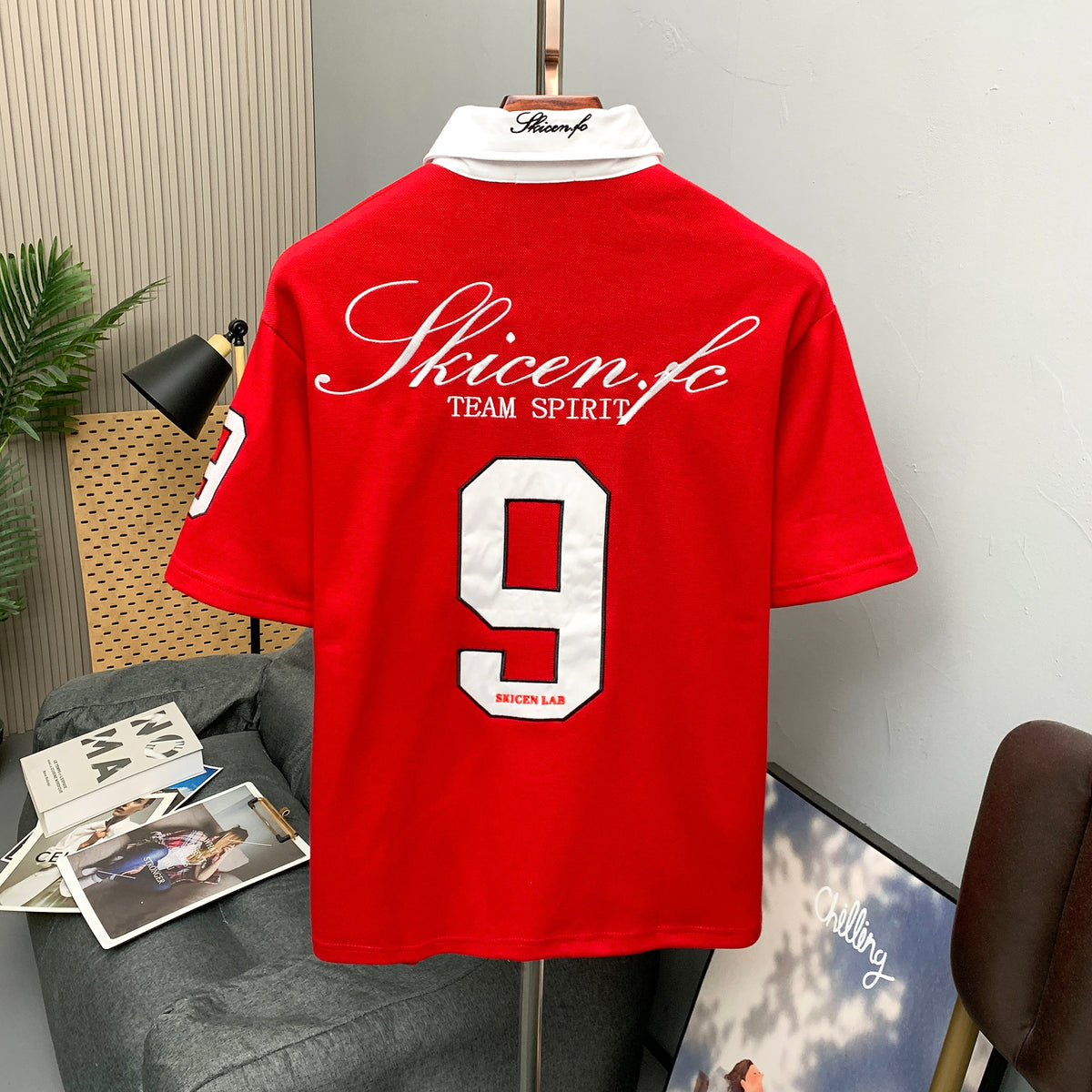 Contrast Collar Soccer Polo Shirt in red hanging back