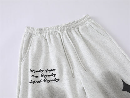 Spray Paint Star Print Distressed Sweatpants