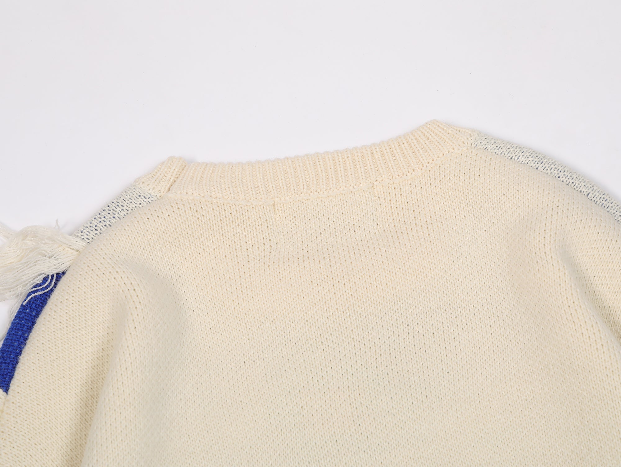 Tassel Groove | Texturierter Patchwork-Pullover