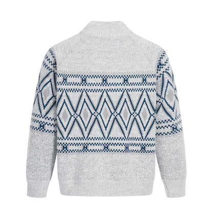 Pull texturé à rayures et à pompons