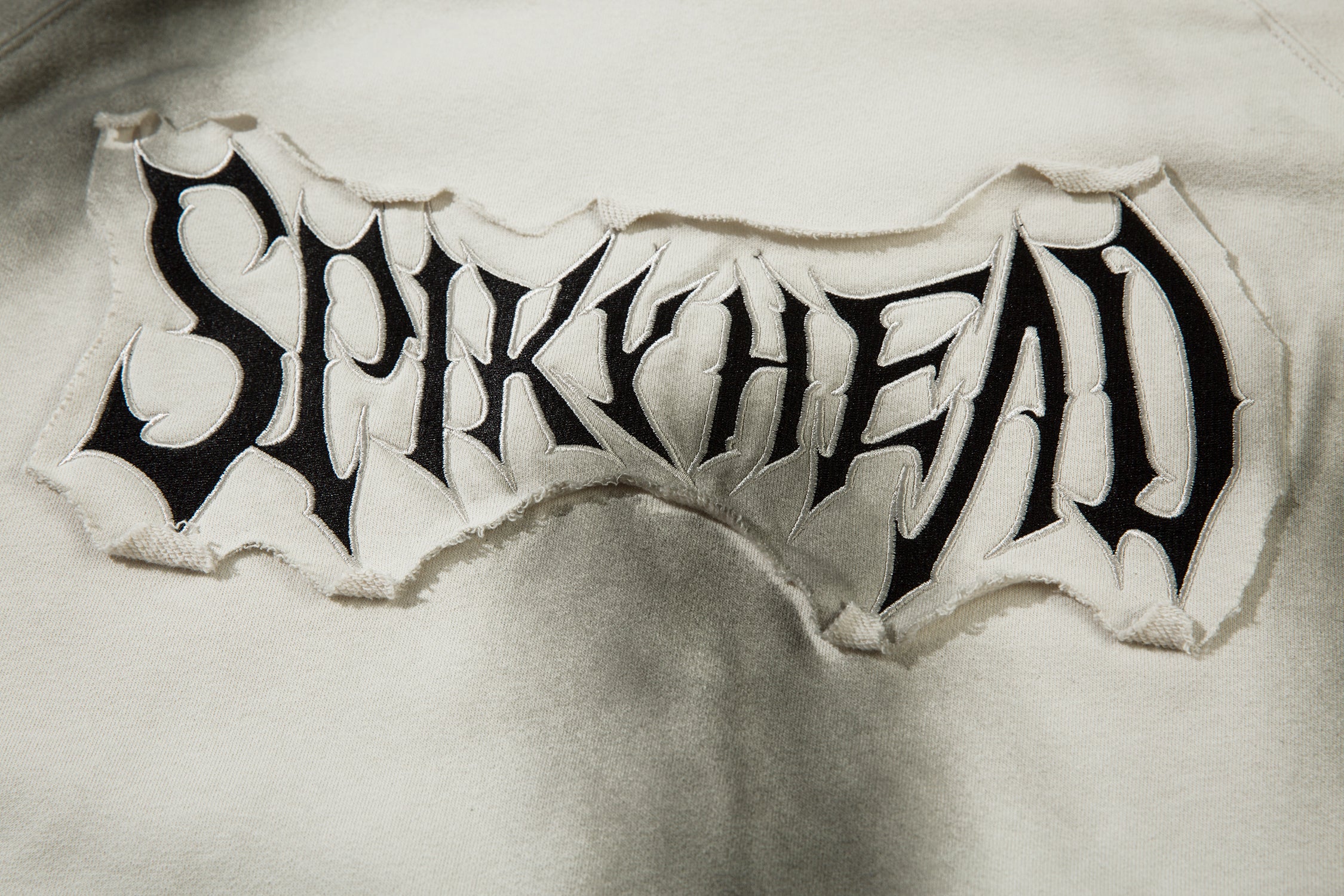 Spikehead | Sweat à capuche tie-dye audacieux